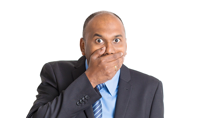 businessman covered mouth